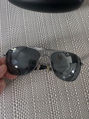 Oakley Silver Aviator Sunglasses with Dark Gray Lenses